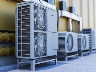 close-up-on-heat-pump-outside-home